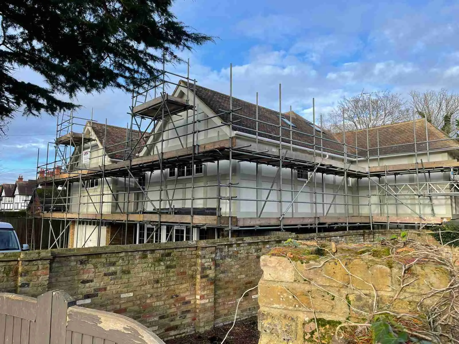 Domestic scaffolding erected by ATC Scaffolding around a house for roofing and exterior works