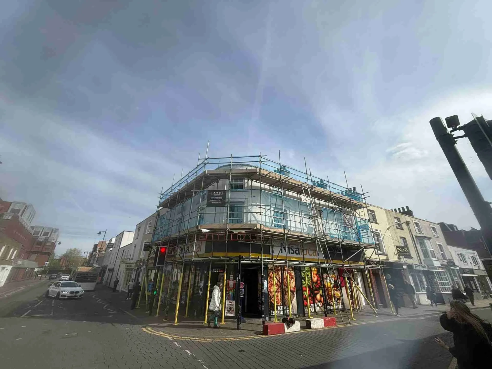 Commercial scaffolding erected by ATC Scaffolding on a high street building
