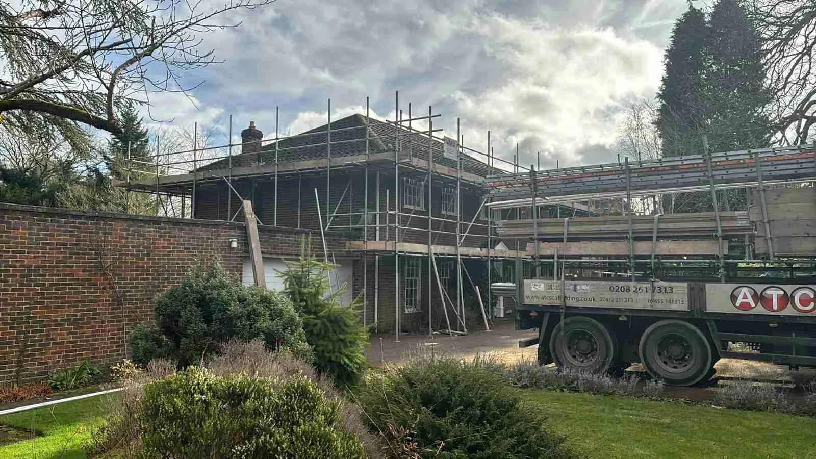 Domestic scaffolding erected by ATC Scaffolding around a house for roofing and exterior works