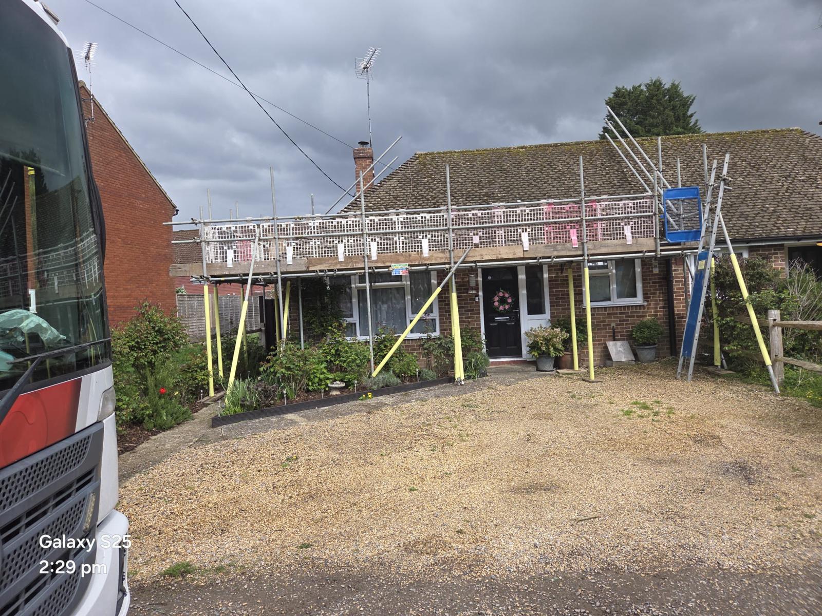 Domestic scaffolding erected by ATC Scaffolding around a house for roofing and exterior works