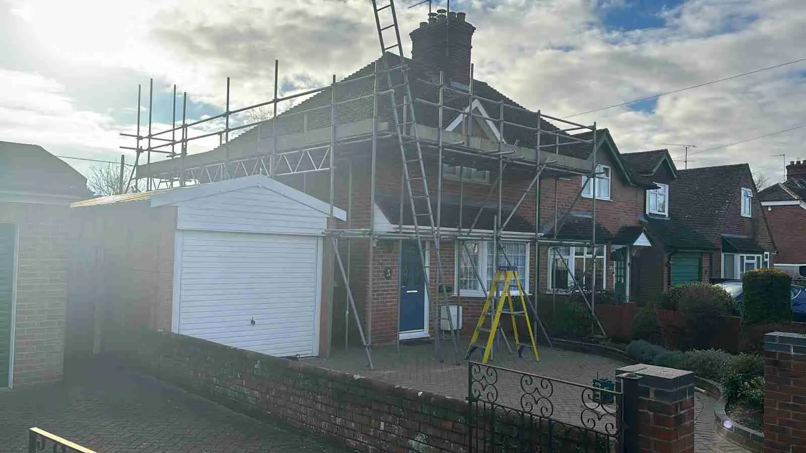 Domestic scaffolding erected by ATC Scaffolding around a house for roofing and exterior works