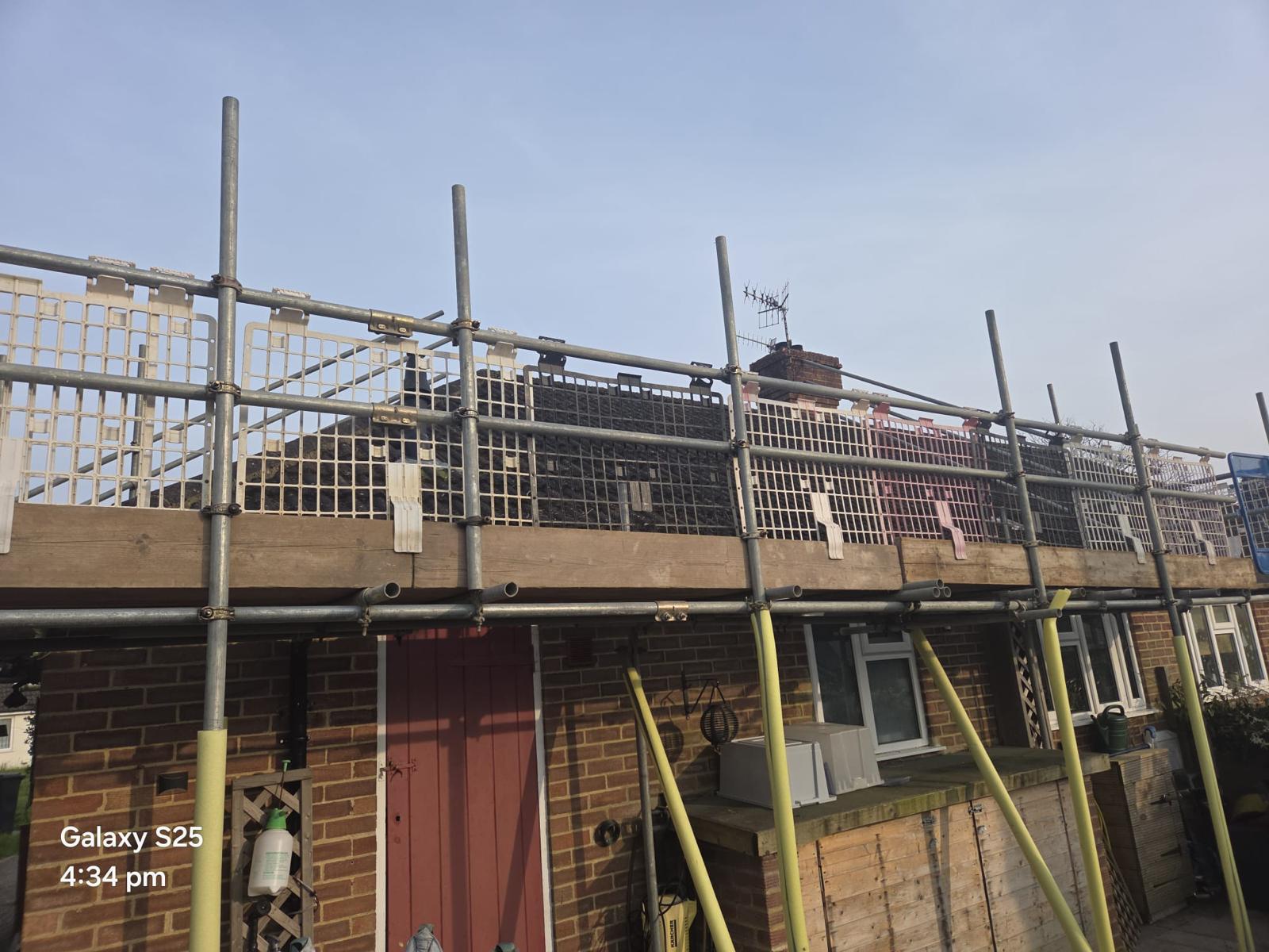 Domestic scaffolding erected by ATC Scaffolding around a house for roofing and exterior works