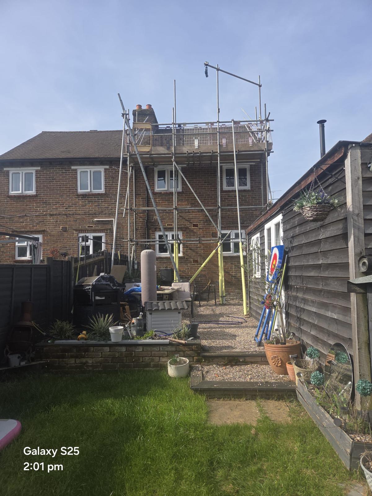 Domestic scaffolding erected by ATC Scaffolding around a house for roofing and exterior works