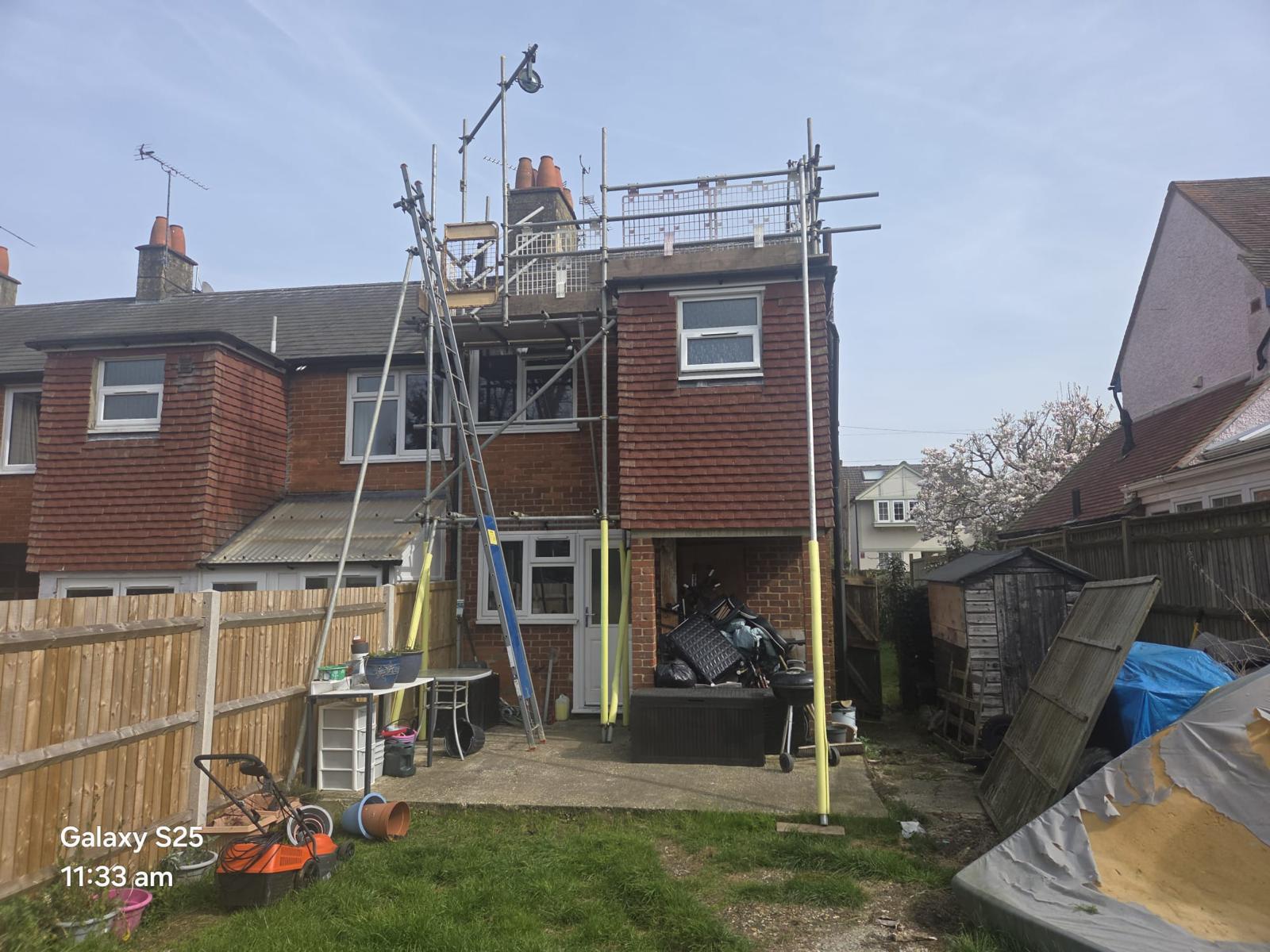 Domestic scaffolding erected by ATC Scaffolding around a house for roofing and exterior works