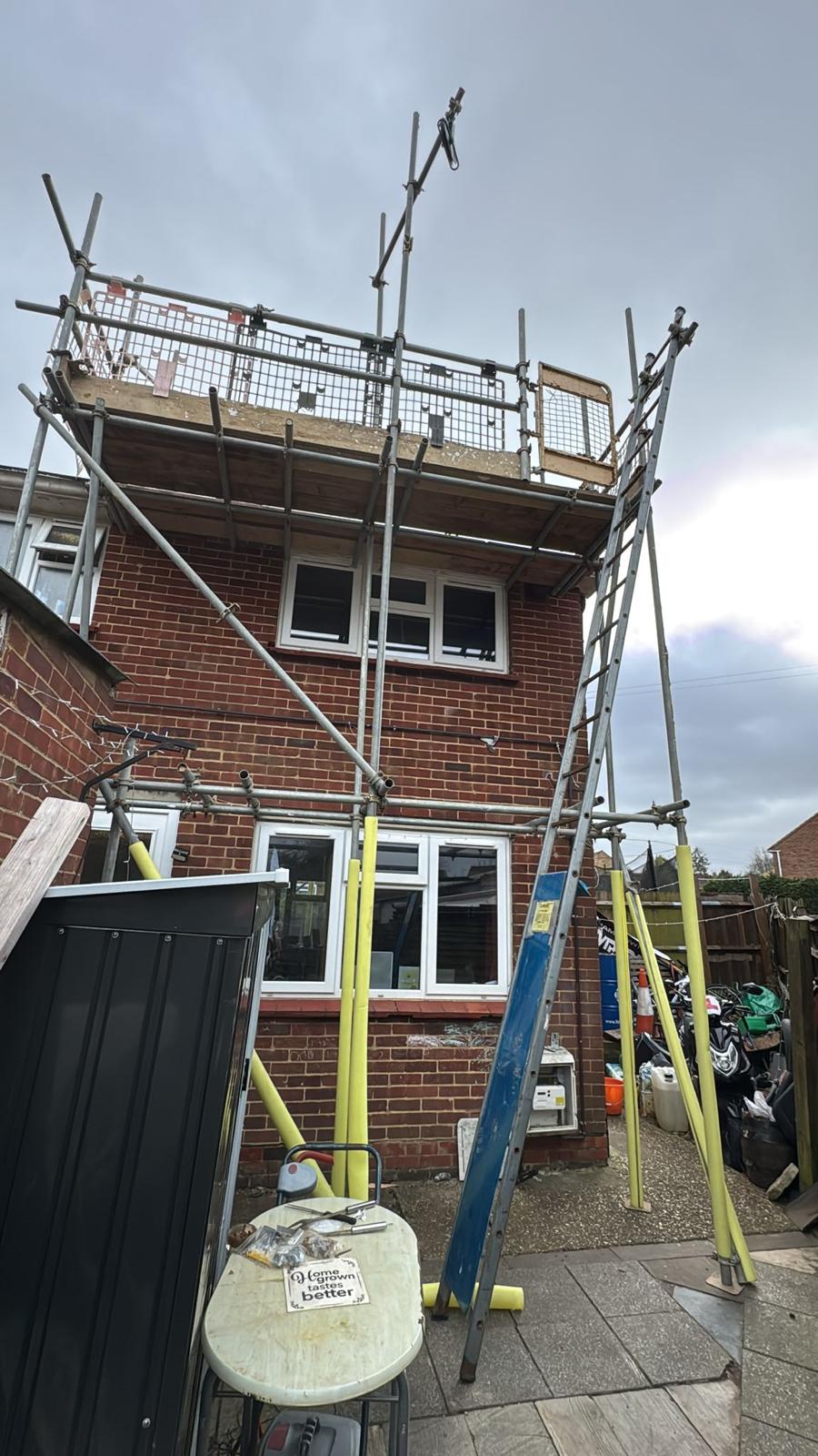 Domestic scaffolding erected by ATC Scaffolding around a house for roofing and exterior works